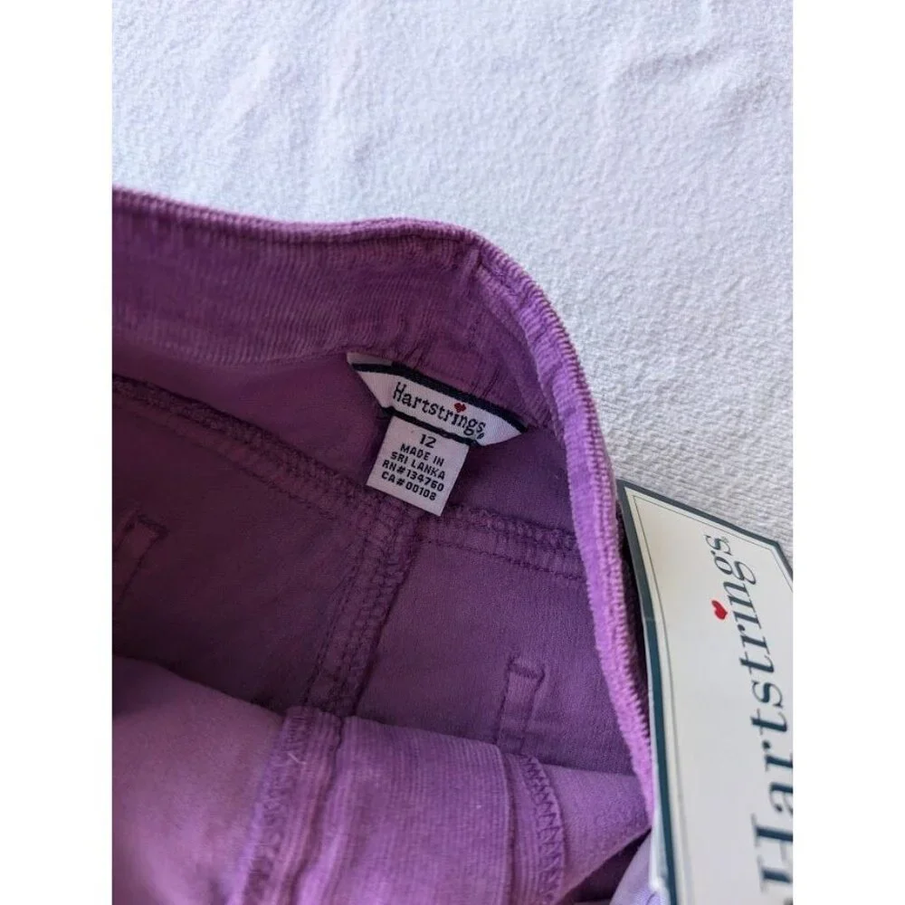 Hartstrings girl’s purple
